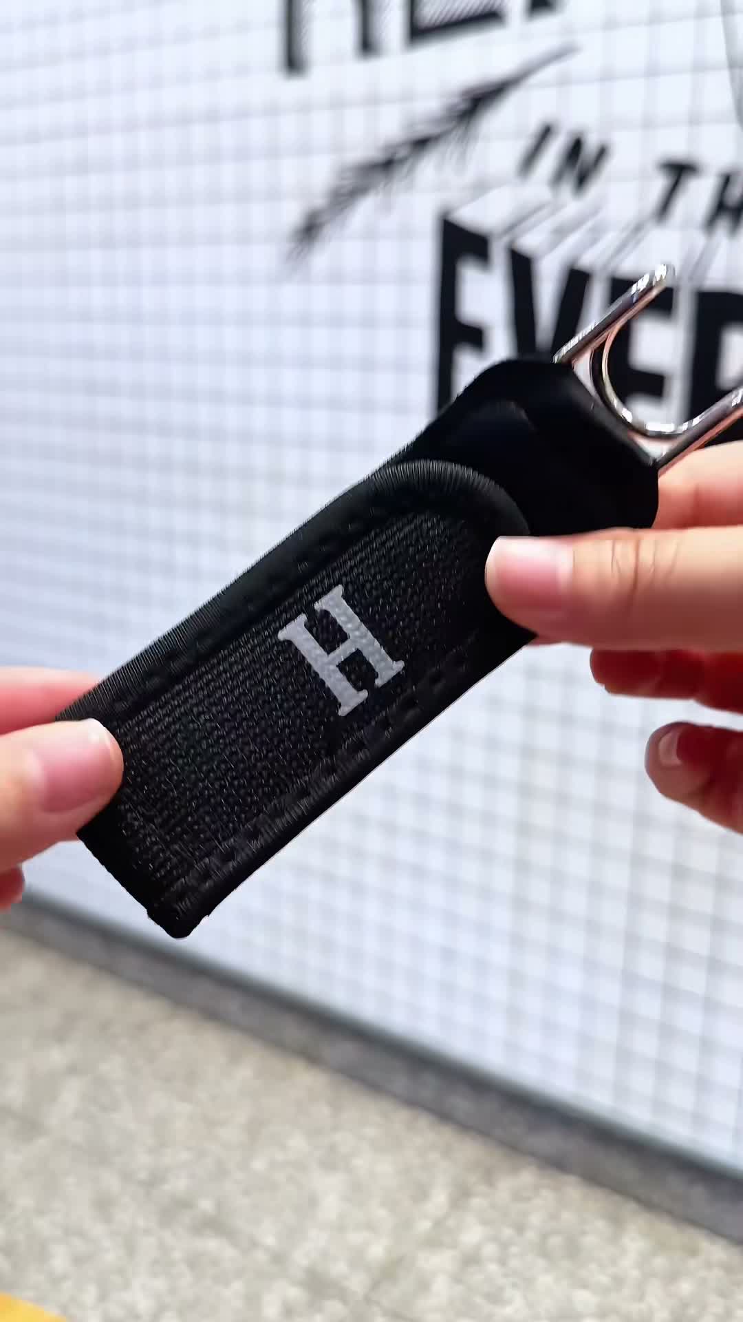 Close-up of the metal U-hook that clips into a belt loop