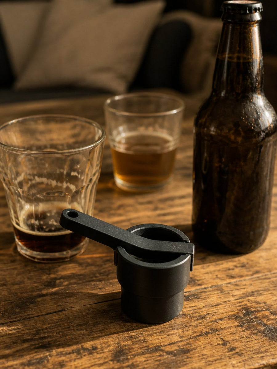 CapBlast bottle cap launcher on a crown-cap beer bottle