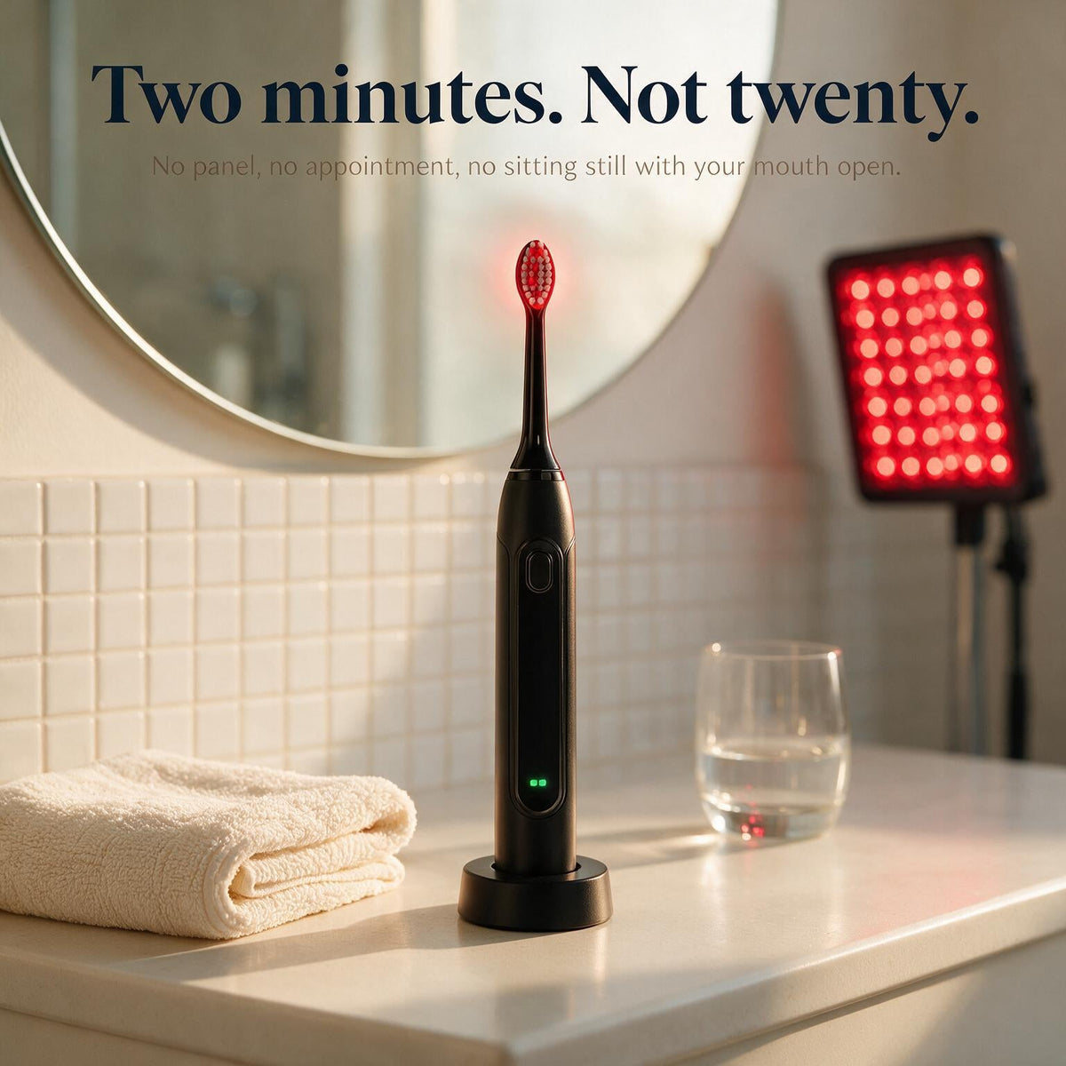 smilume on a bathroom shelf beside an unused red light panel, two minutes not twenty